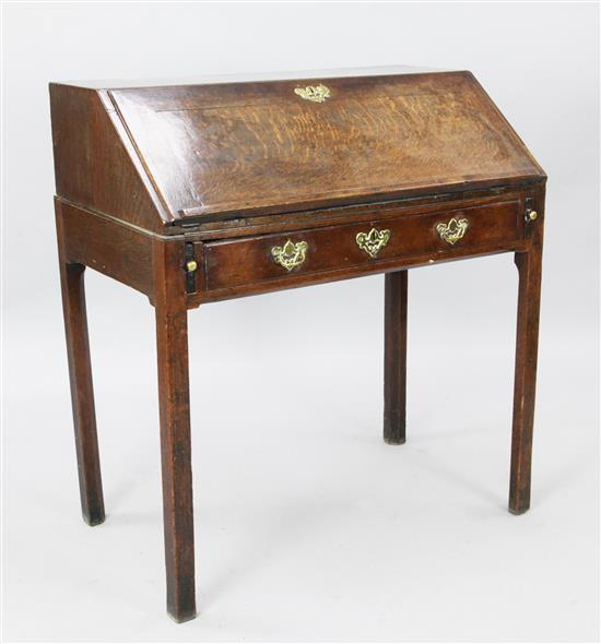 An 18th century oak bureau, W. 3ft. D. 1ft 9in. H. 3ft 4in.